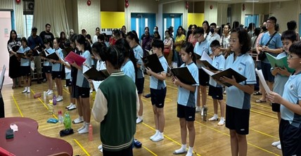 AGPS Choir showcasing their singing skills by performing for parents during the school’s Open House CCA tour